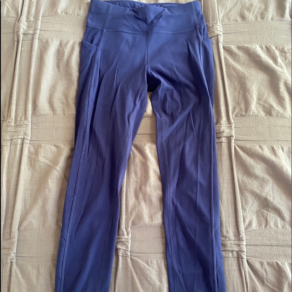 athleta girl leggings with criss cross legs